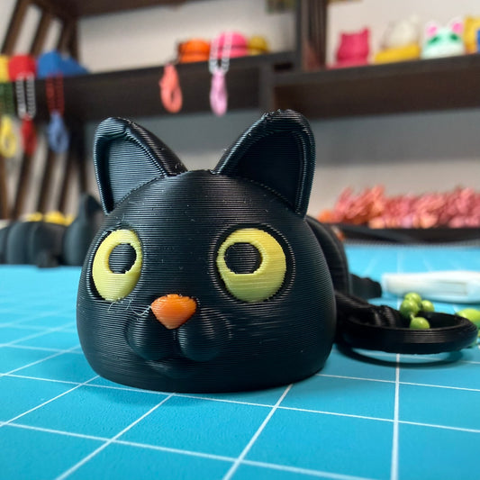 Schwarze Flexi-Kitty